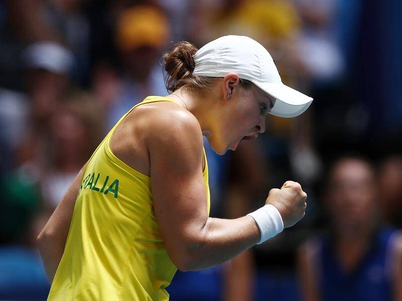 Ashleigh Barty has demolished Caroline Garcia to level Australia's Fed Cup final with France at 1-1.