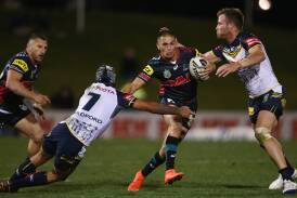 Keen to stay: Will Smith (pictured against North Queensland in 2014) in un-signed for next year but hopes to stay with the Panthers. Picture: Mark Kolbe/Getty Images 