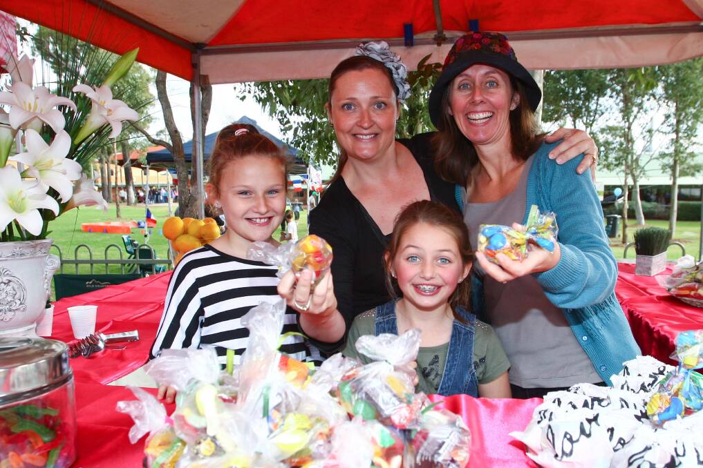 Madison Miller, Annabelle and Juanita Beazley with Penny Miller at last year's Arndell Anglican College Family Day. Picture: Geoff Jones