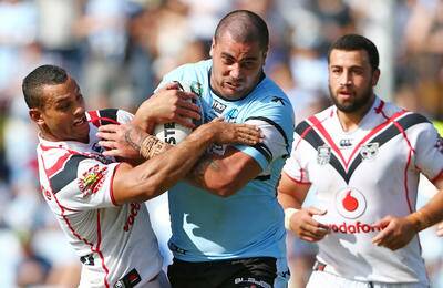 Sharks prop Andrew Fifita tries to muscle his way through the Warriors defence last Saturday in Cronulla's big win. Photo: Getty Images
