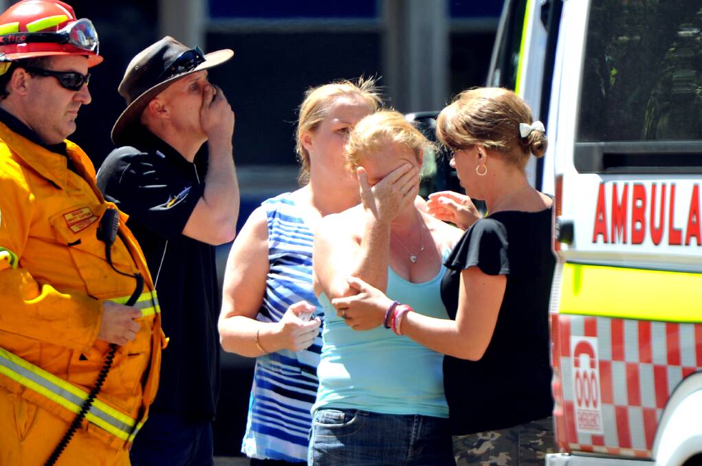 Bridget Wright's mother Alaina breaks down as she is told of her daughter's death at Pitt Town Public School on Friday. Picture: Kylie Pitt