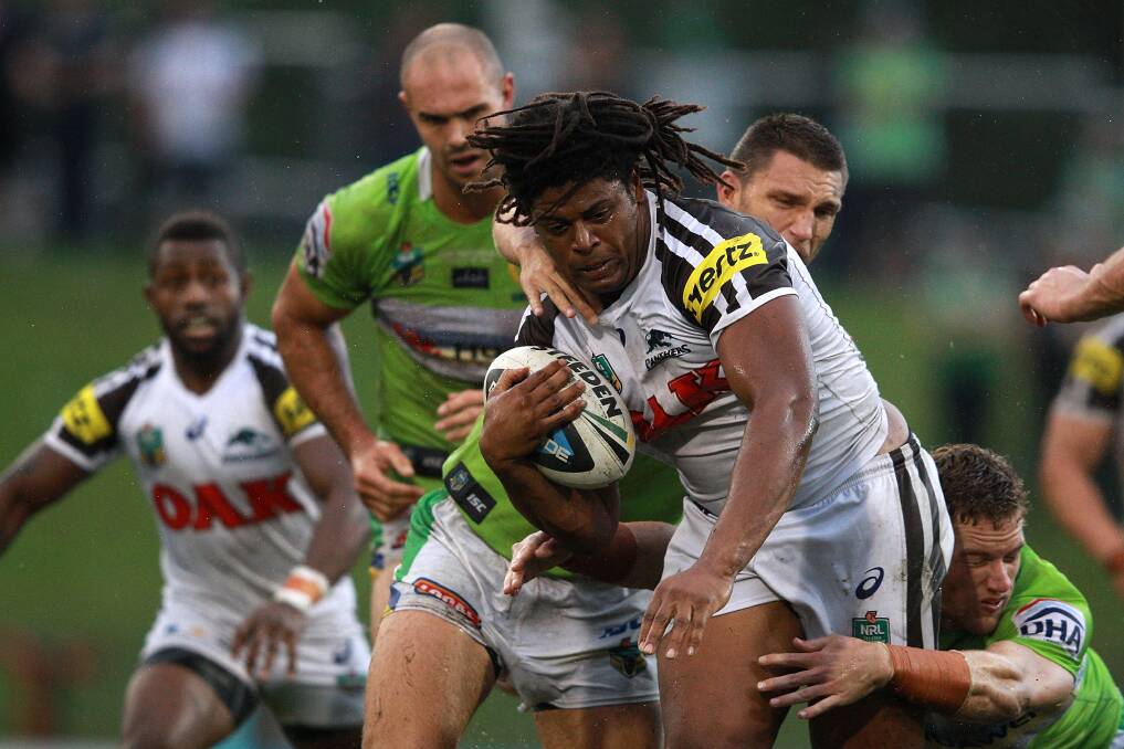 SYDNEY, AUSTRALIA - APRIL 05: Jamal Idris of the Panthers is tackled during the round five NRL match between the Penrith Panthers and Canberra Raiders at Sportingbet Stadium on April 5, 2014 in Sydney, Australia. (Photo by Matt Blyth/Getty Images)