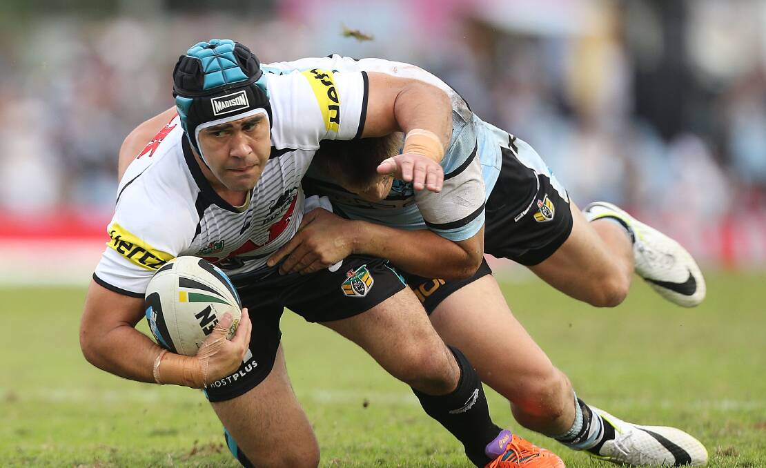 SYDNEY, AUSTRALIA - APRIL 26: Jamie Soward of the Panthers is tackled by Blake Ayshford of the Sharks during the round 8 NRL match between the Cronulla-Sutherland Sharks and the Penrith Panthers at Remondis Stadium on April 26, 2014 in Sydney, Australia. (Photo by Mark Metcalfe/Getty Images)