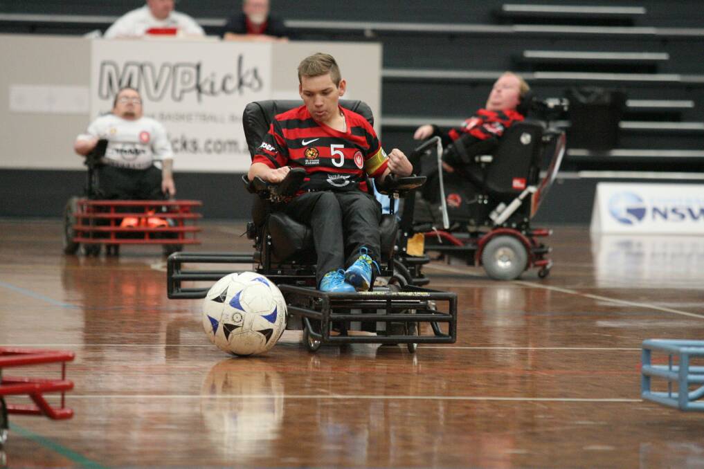 Jacob Cross plays for the Western Sydney Wanderers Powerchair Football team. Picture: Helen Nezdropa