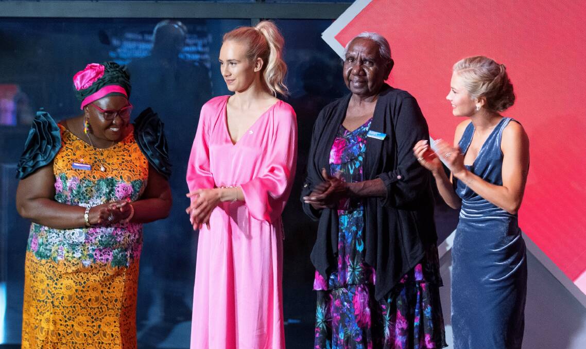 Grace Tame (right) onstage with fellow award winners. Picture: Sitthixay Ditthavong