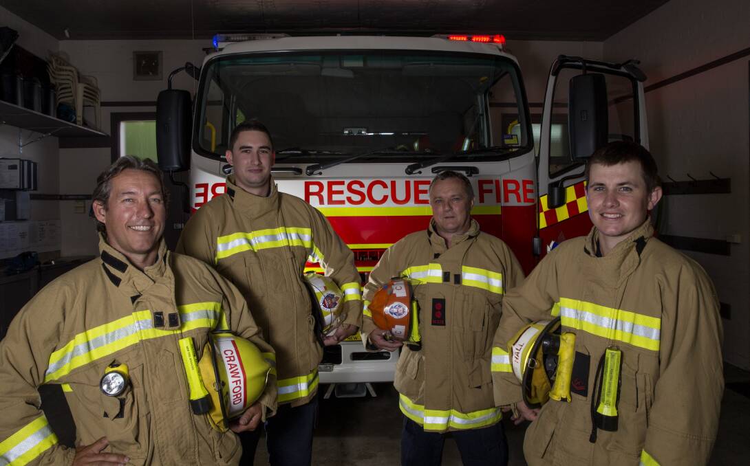 NSW Fire Brigades firefighters (L) Stephen Crawford, Joel Smelcher, Aaron Hall and Captain Kim Roche at the Windsor firehouse. Picture: Geoff Jones .