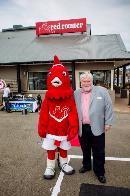 Mayor Kim Ford with Reggie the Rooster at the opening of the Windsor Red Rooster last weekend.