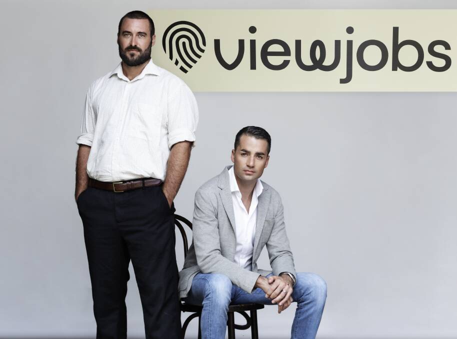 ViewJobs managing director Lewis Romano, seated, with chief operating officer Jarrah Kammoora. Picture supplied