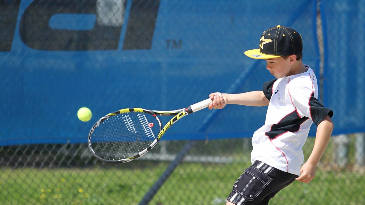 A child playing on the courts at the Richmond Tennis Centre in 2014. Picture: Gene Ramirez