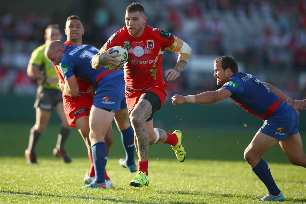 MATURED: Josh Dugan on his way to scoring a try for St George Illawarra. Picture: Getty Images