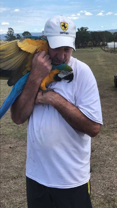Barry Lane was reunited with his beloved Snappa, after the bird was startled and flew off from his property. Picture: Supplied