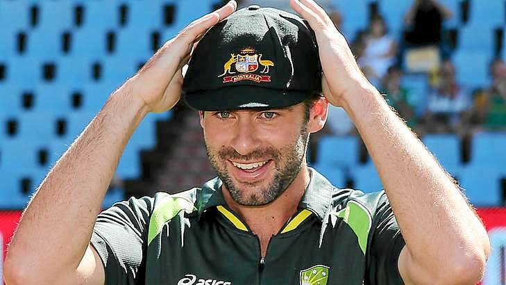 Baggy green: Alex Doolan of Australia is congratulated by teammates after receiving his cap before day one of the First Test match between South Africa and Australia. Photo: Morne de Klerk