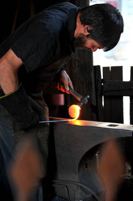  Custom ironwork: Wayne Wagstaff has made tables, a coat rack, a wood carrier, door knockers and candleholders, among other things, for the Arcadian Artists Trail. Pictures: Kylie Pitt