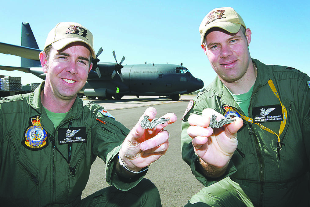 Sergeants Robert Hobbs and Richard Falkenmire are the last C-130 Hercules flight engineers to be trained by the Air Force, ending a 54-year era of flight engineers working on the transport workhorse.