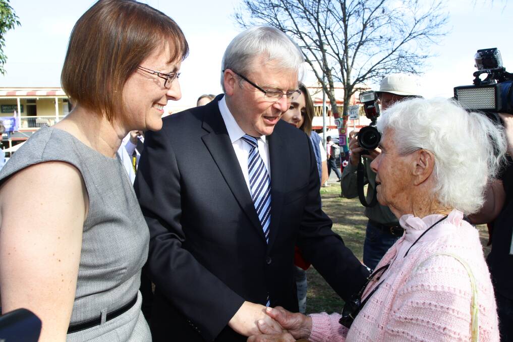 Prime Minister Kevin Rudd and Labor candidate for Macquarie Susan Templeman, meet South Windsor resident Rita Taylor. Picture: Carlos Furtado