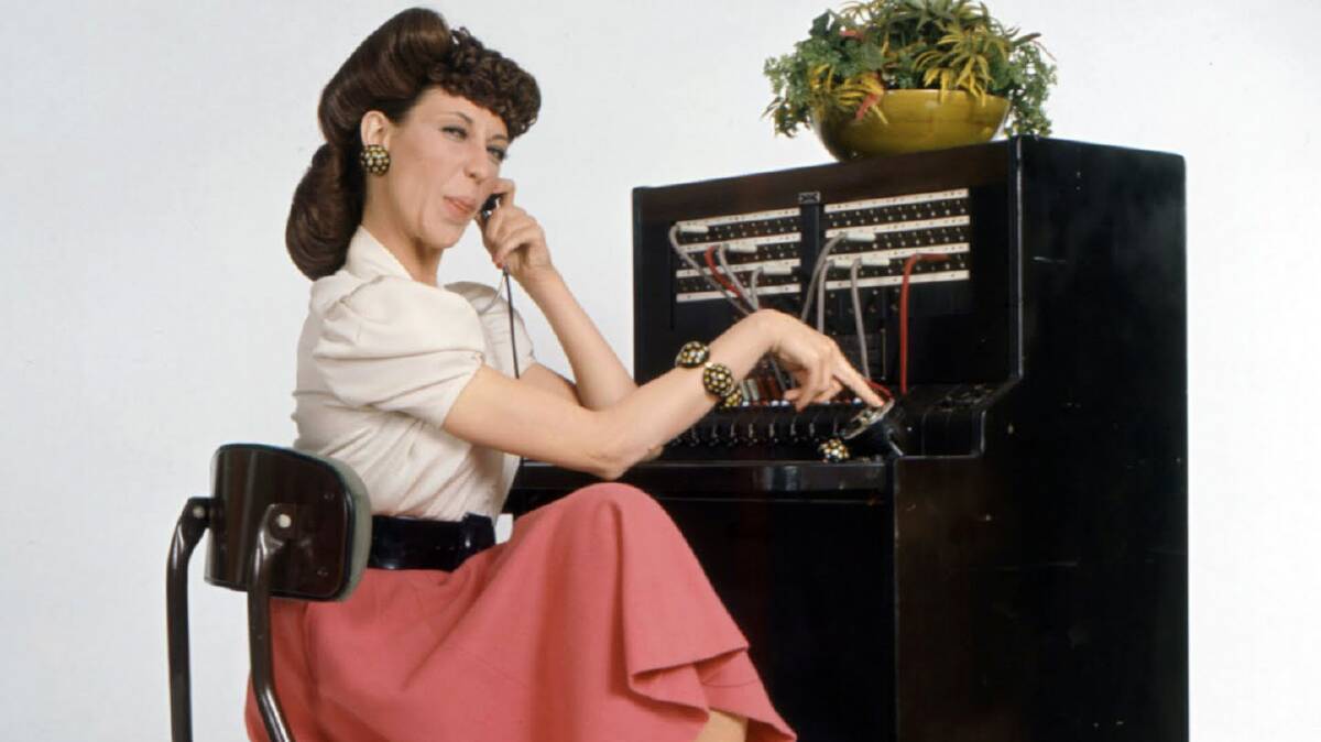 As Ernestine, the vicious switchboard operator, on Rowan & Martin's Laugh-In.